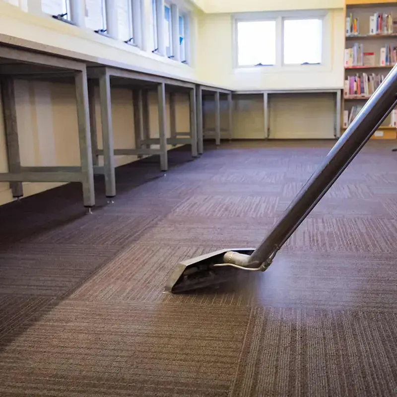 Extraction wand pulling water out of wet carpet in Walnut Creek
